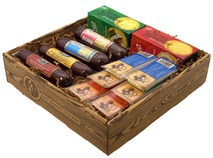 Wooden charcuterie gift box with sausages, cheese crackers, and assorted snack packs