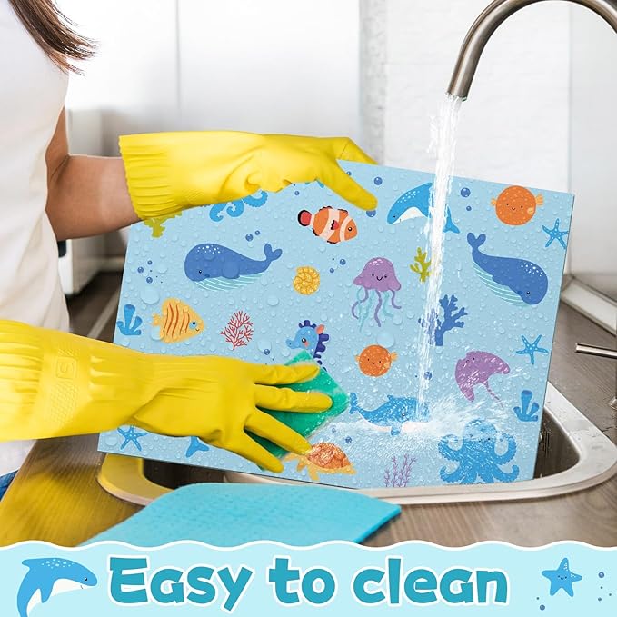 Blue sea-life kids placemat with dolphins, fish, and jellyfish cartoon print