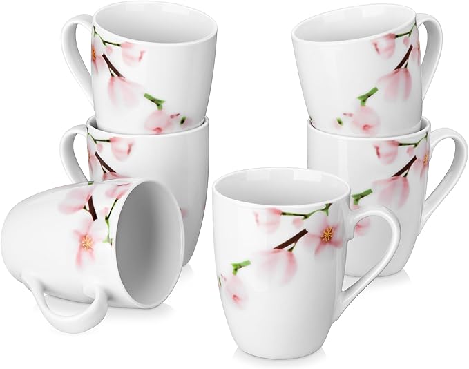 Floral ceramic coffee mug set, white cups with pink blossoms and curved handles