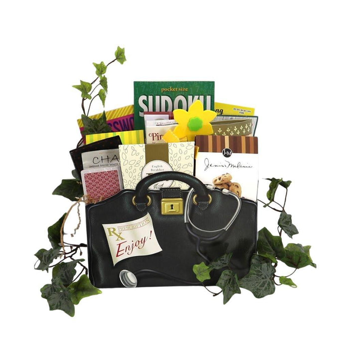 Gift basket with black handbag, assorted tea packets, yellow flower and green leaf decor