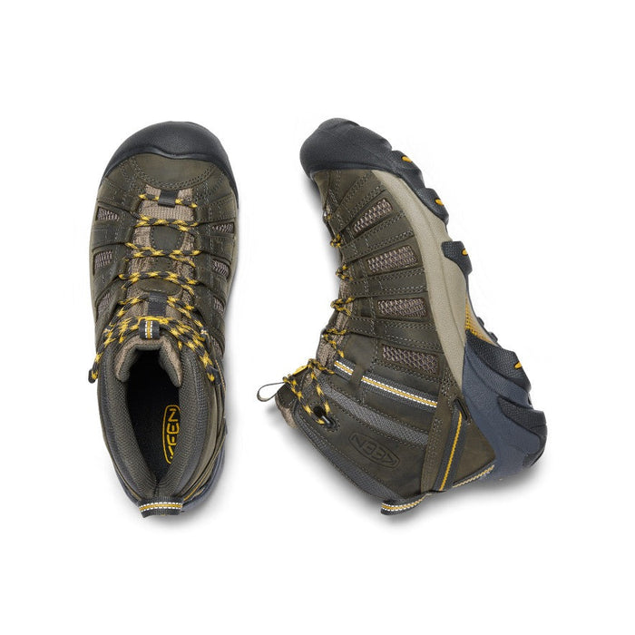 Keen Voyageur Mid hiking boots in olive green and tan with breathable mesh panels and yellow-accented laces, top view.