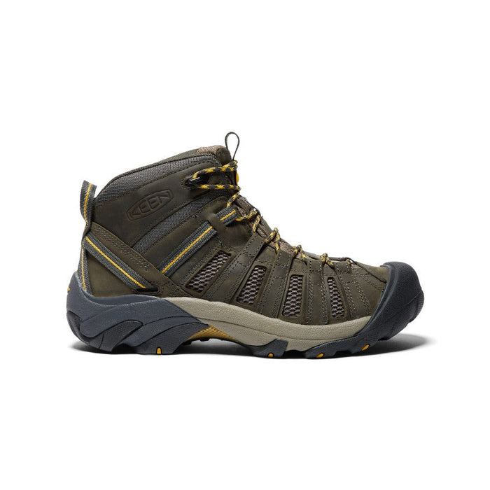 Keen Voyageur Mid hiking boots in brown with breathable mesh panels, durable leather overlays, and rugged sole, side view.