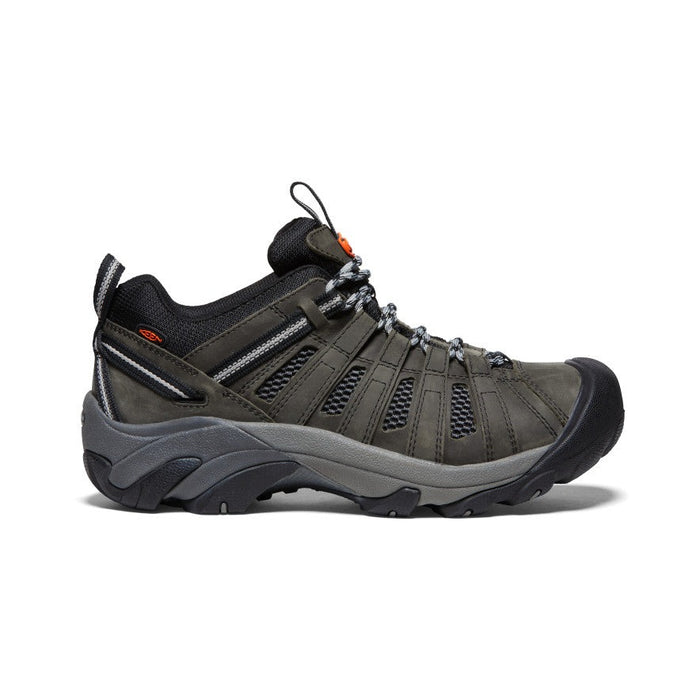Keen Voyageur hiking shoes in dark gray with breathable mesh panels, durable leather overlays, and rugged sole, side view.