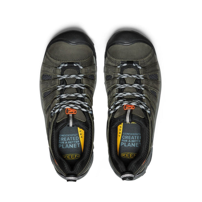 Keen Voyageur hiking shoes in olive green with black accents, durable mesh panels, and lace-up closure, top view.