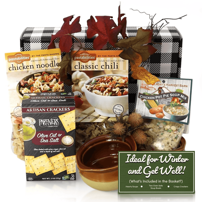 Assorted soup and cracker gift box with two bowls and fall leaves, ready to gift.