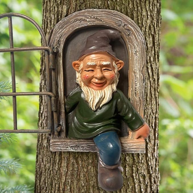Small garden gnome statue peeking from arched metal window, green shirt and blue pants