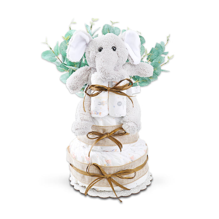 Two-tier baby diaper cake with plush elephant, teal leaf accents, ribbon bows, folded diapers