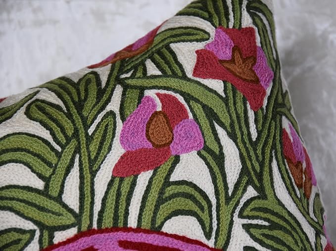 Embroidered blossoms and green leaves on cream flamingo pillow cover