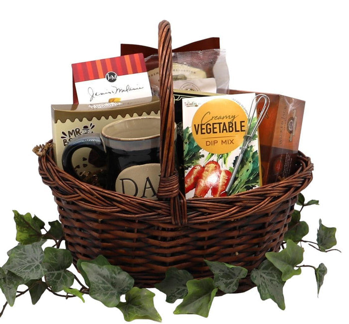 Wicker snack gift basket with mug, vegetable dip mix, and packaged snack boxes