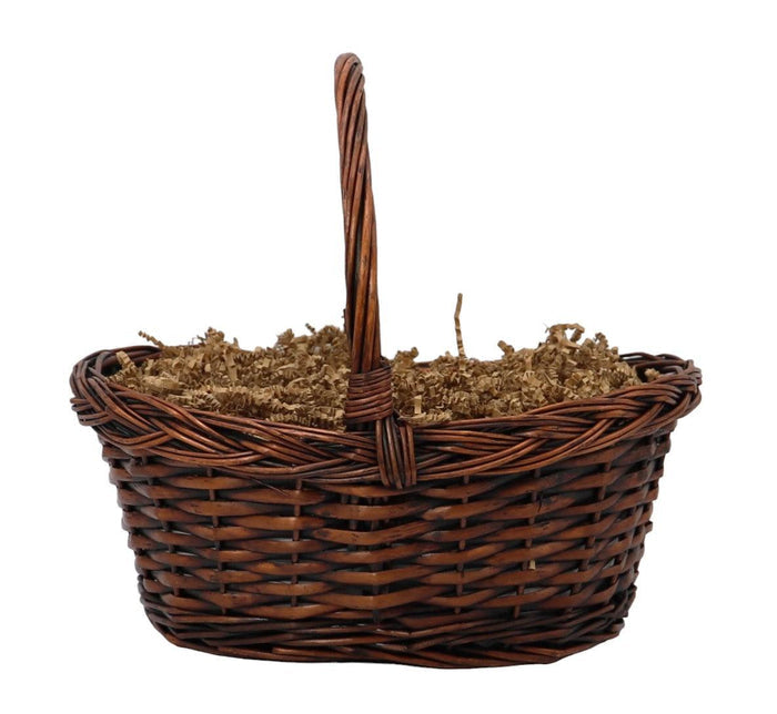 Wicker basket filled with shredded filler and assorted snack bags