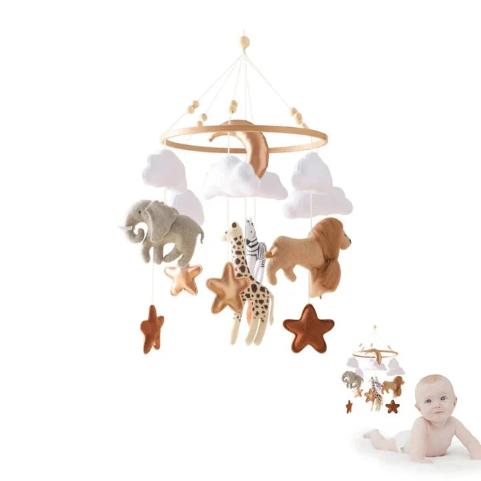 Wooden crib mobile with felt animals and stars hanging from a round hoop