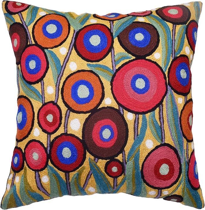 Embroidered wool pillow cover with multicolor circular floral motif and dotted accents