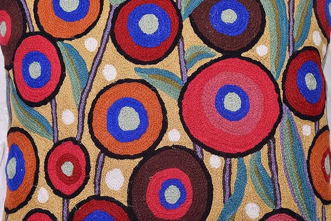 Embroidered wool pillow cover with multicolor ring pattern and small white dots