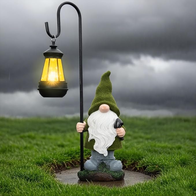 Solar gnome yard statue with glowing lantern light, green hat and white beard, outdoor resin