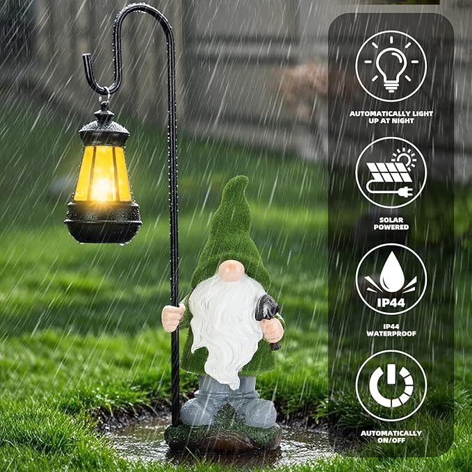 Solar gnome yard statue with lit lantern in rain, green hat and white beard, outdoor resin