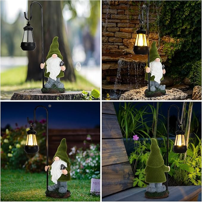 Solar gnome statue with lit lantern, green hat and white beard, shown outdoors at night