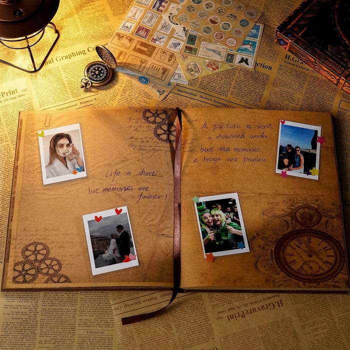 Opened zodiac scrapbook album with multiple photos and handwritten journaling on pages