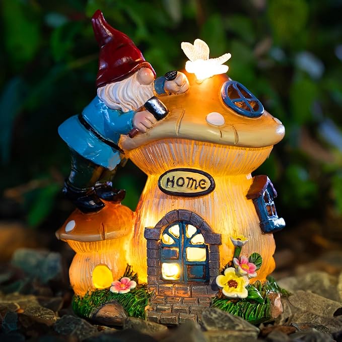 Solar garden gnome figurine with glowing lantern house, red hat, blue coat